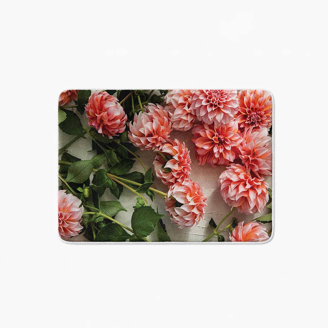 FLORAL ORANGE SCATTERED DAHLIAS WITH LEAVES BATHMAT