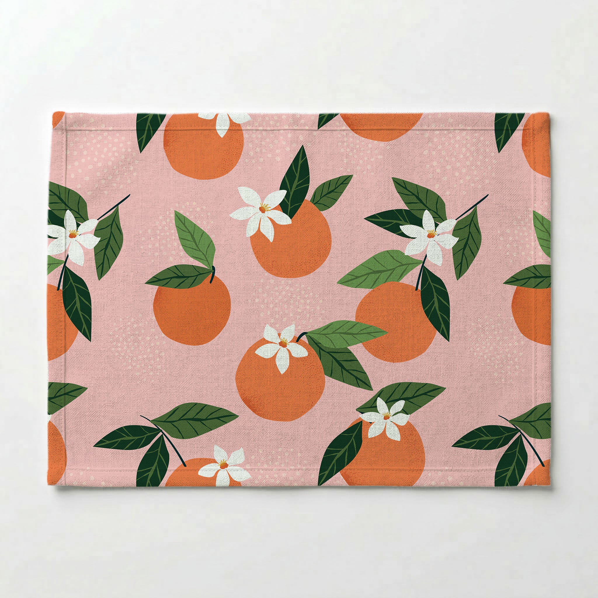 CITRUS AND BLOSSOMS ON PINK PLACEMAT