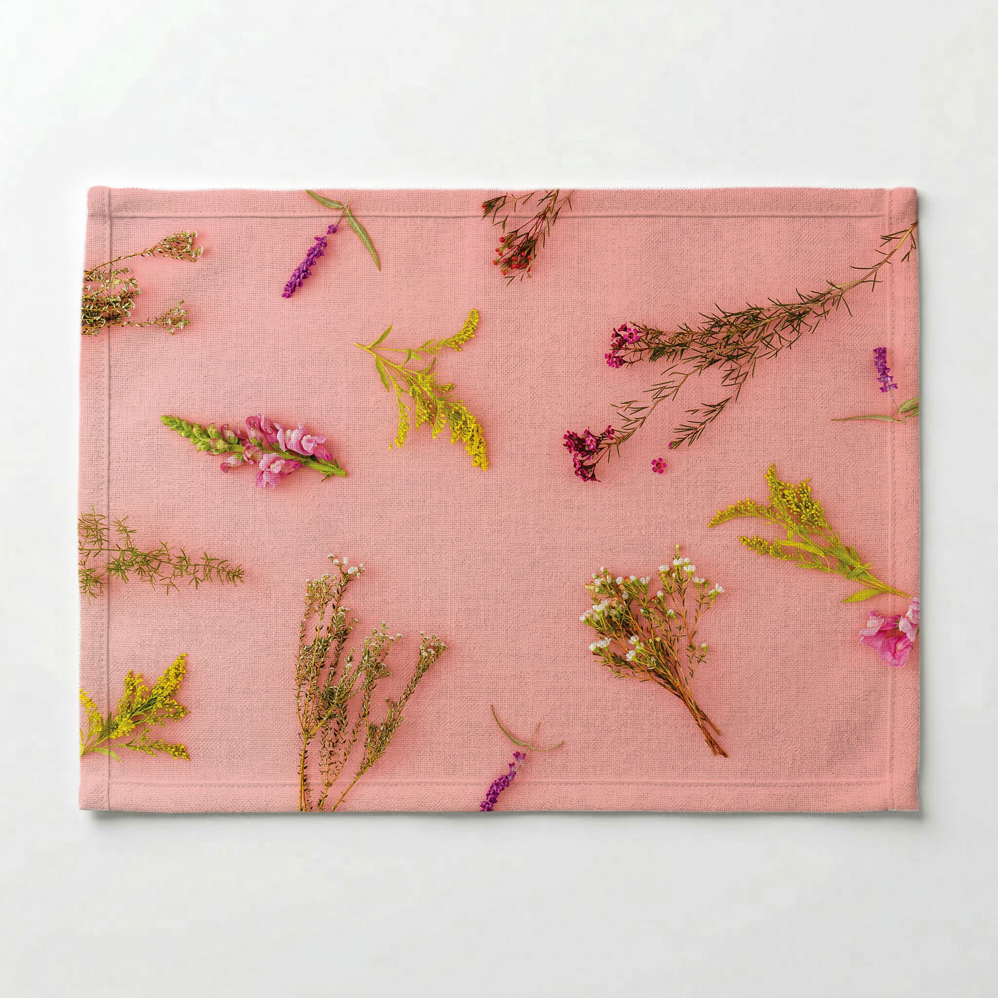 SCATTERED BLOSSOMS ON PINK PLACEMAT