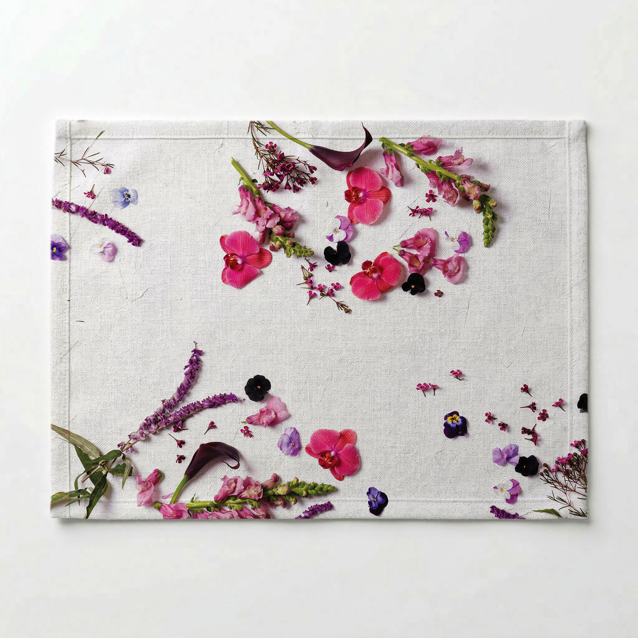 SCATTERED BLOSSOMS ON WHITE PLACEMAT