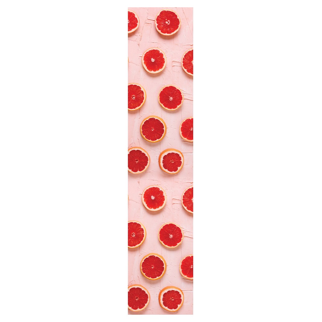 GRAPEFRUIT SLICES ON PINK TABLE RUNNER