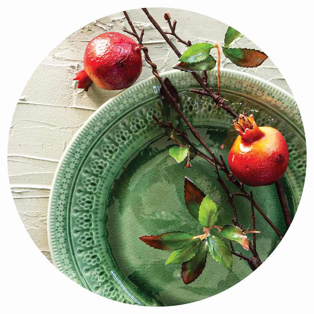 NATURAL RED POMEGRANATES ON GREEN PLATE ROUND COFFEE TABLE
