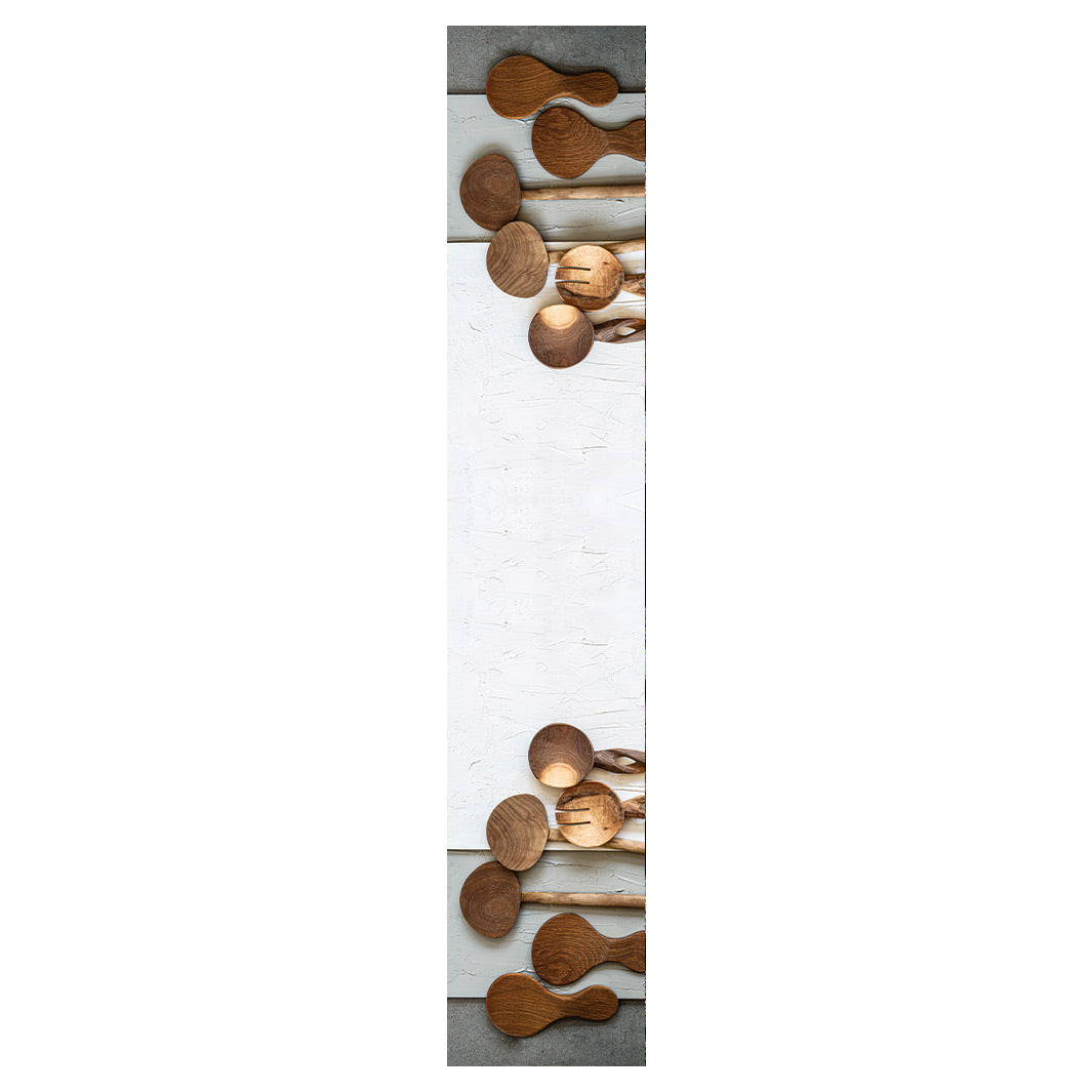 NATURAL BROWN WOODEN SPOONS ON GREY AND WHITE TABLE RUNNER