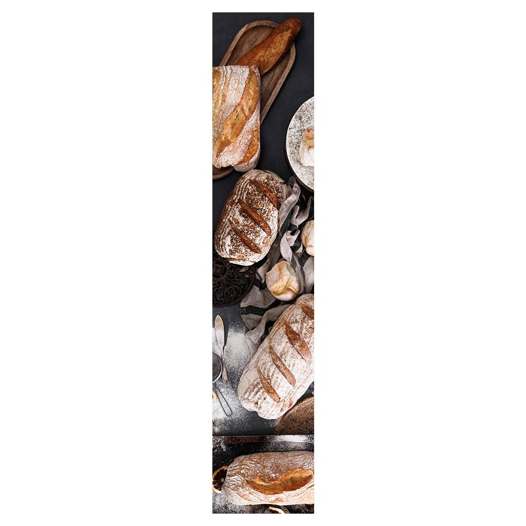 BREADS AND DRIED FRUIT ON BLACK TABLE RUNNER