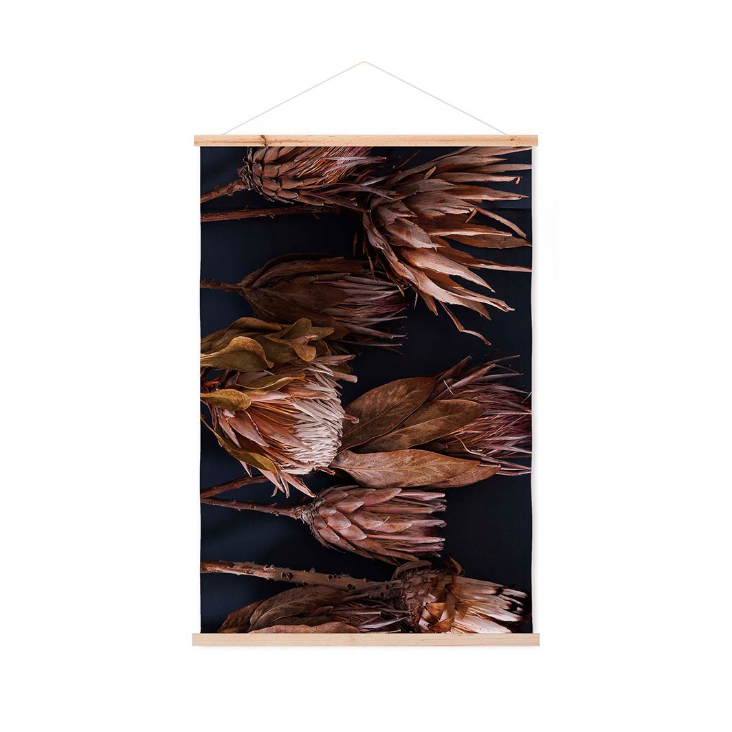 GOLDEN PROTEA ARRANGEMENT ON DARK BLUE WALL HANGING