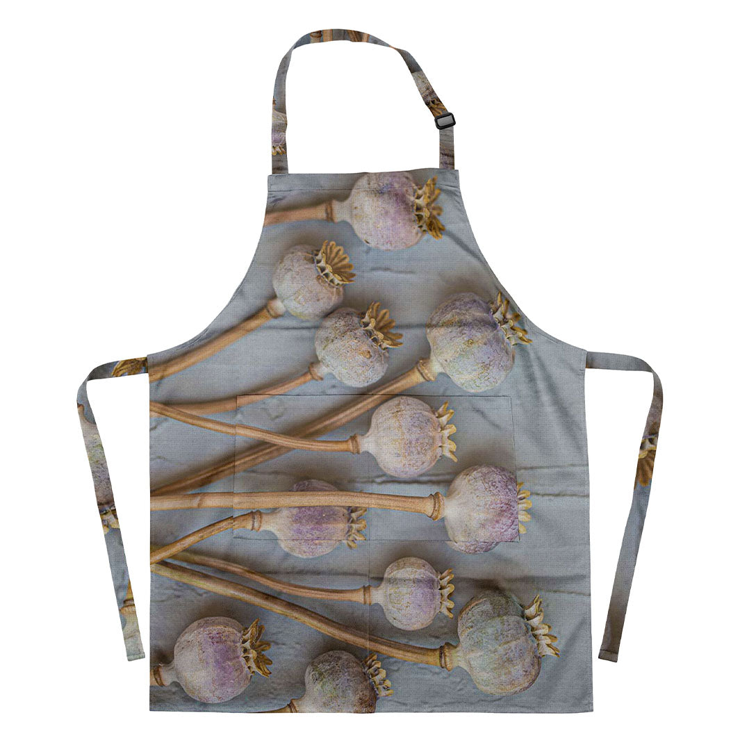 NATURAL PURPLE GIANT POPPY SEEDS ON GREY APRON
