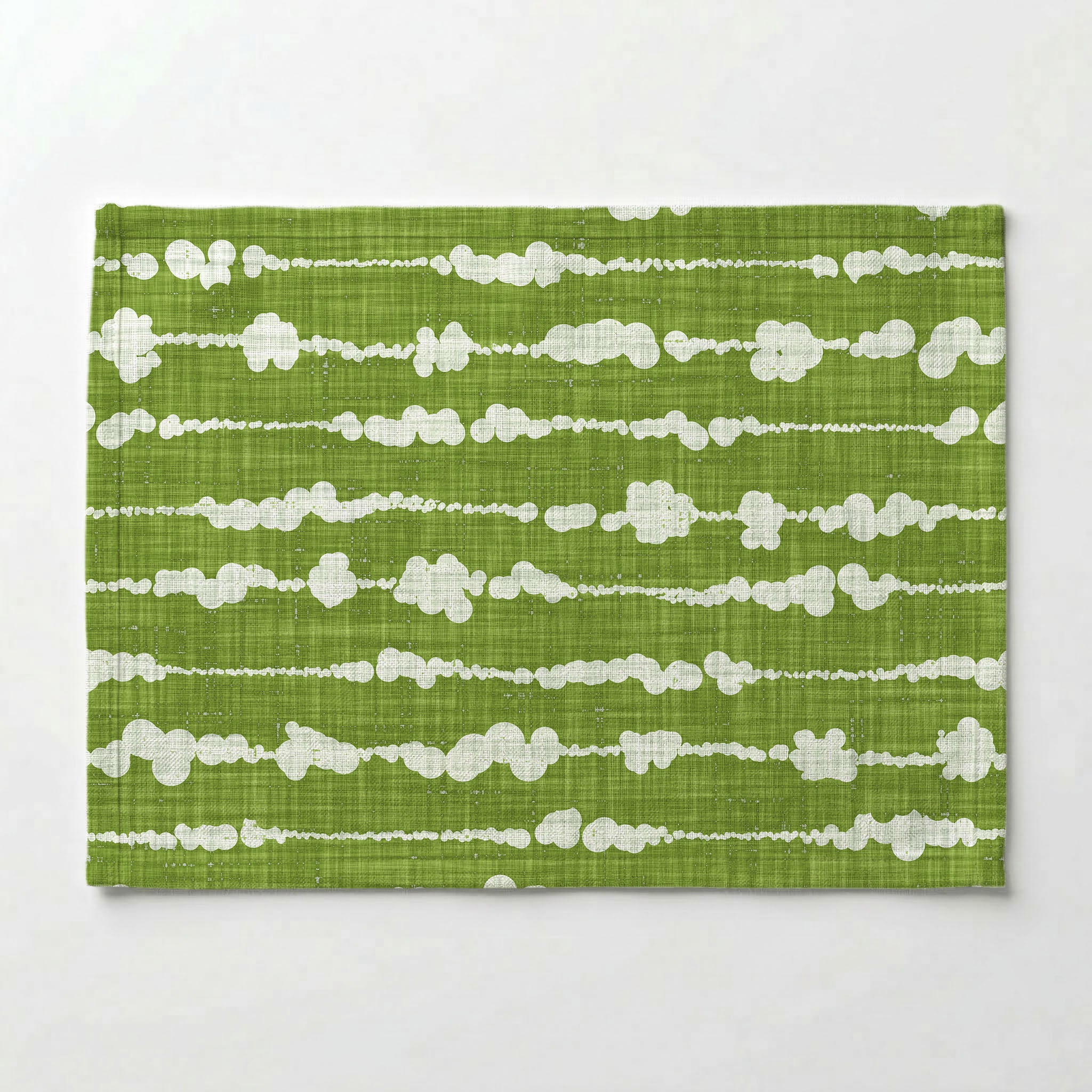 WHITE ORGANIC DOTTED STRIPES ON GREEN PLACEMAT