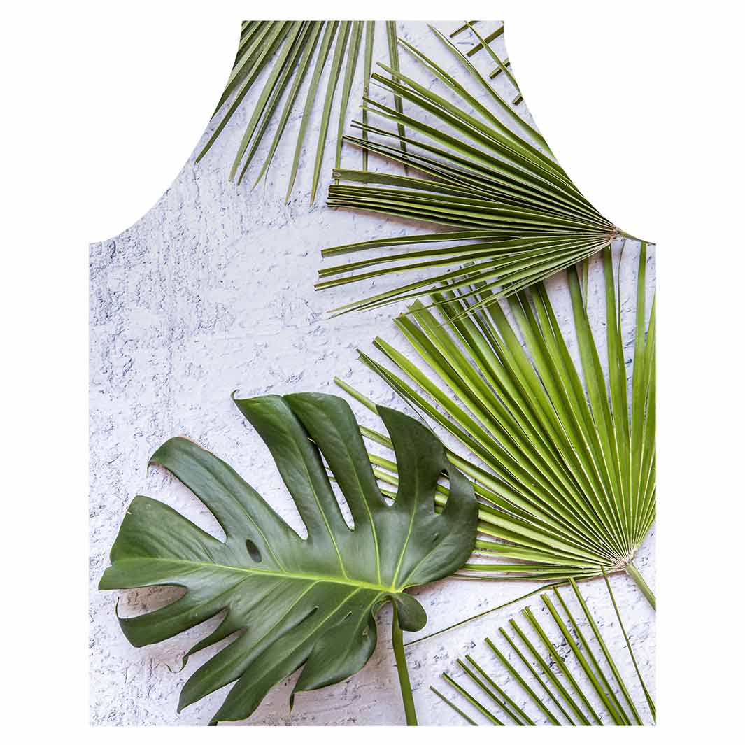 LEAVES GREEN PALM LEAVES ON WHITE APRON