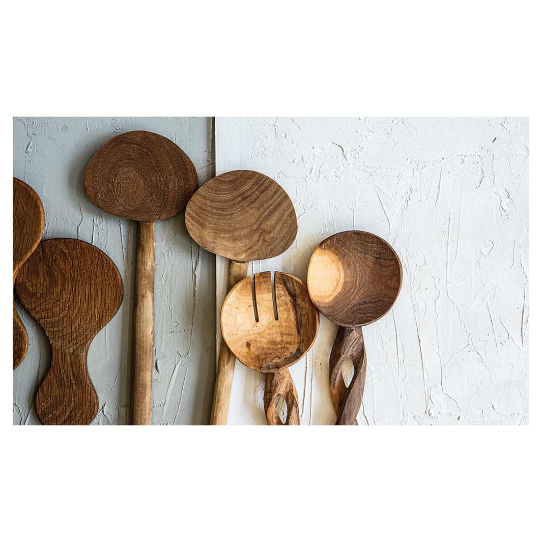 NATURAL BROWN WOODEN SPOONS ON GREY AND WHITE ANTI-FATIGUE KITCHEN MAT