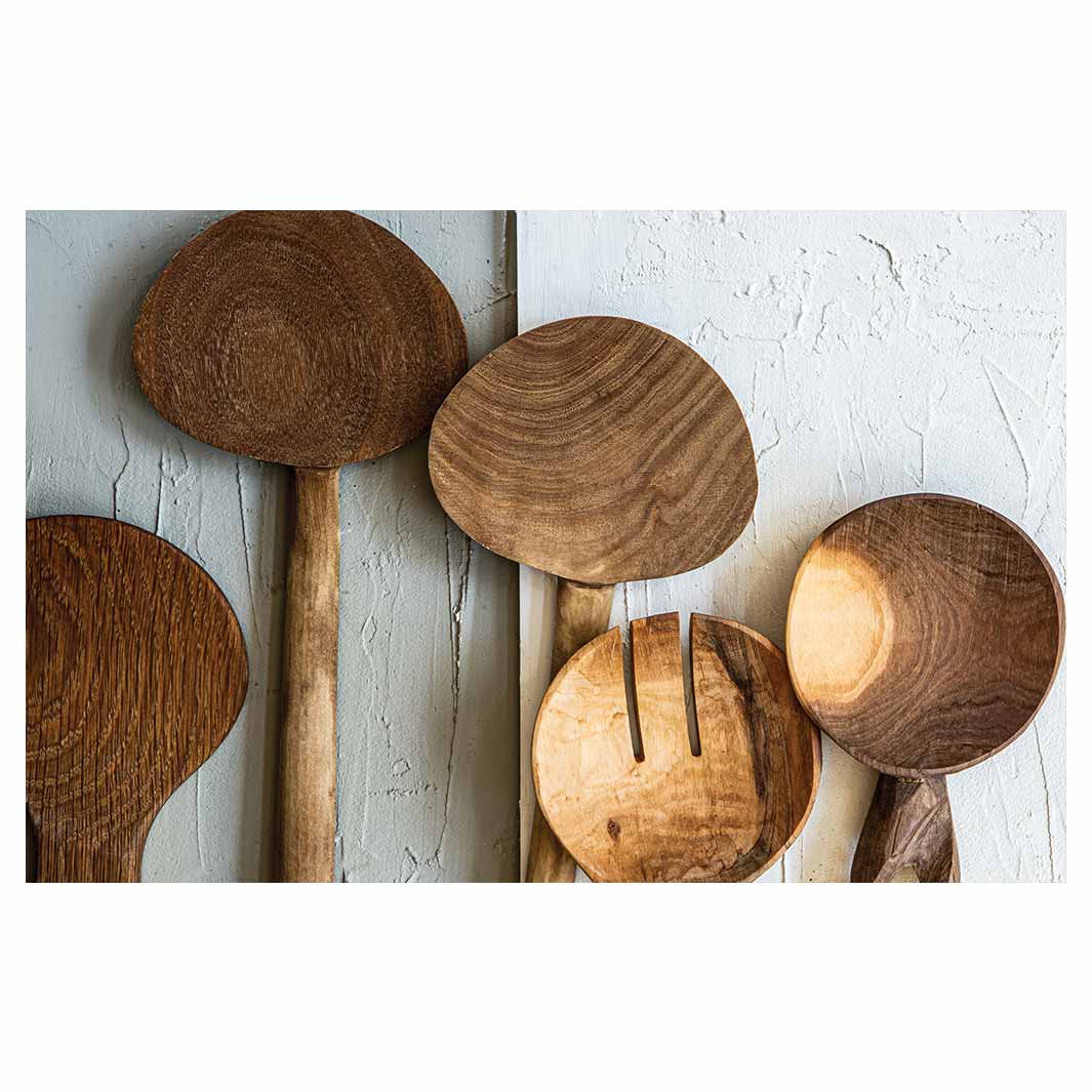 NATURAL BROWN WOODEN SPOONS ON GREY AND WHITE BATHMAT