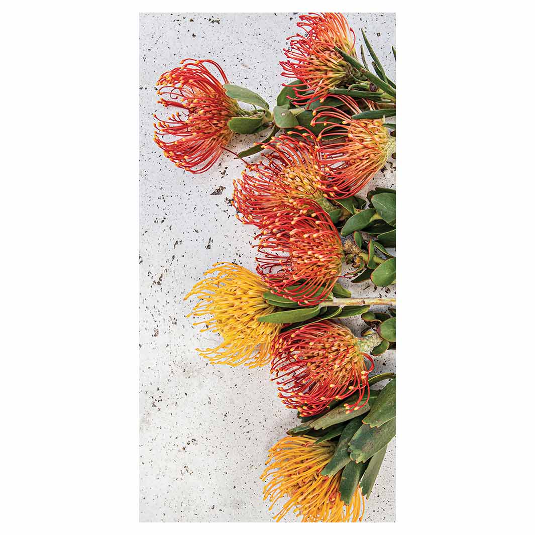 FLORAL ORANGE PIN CUSHIONS ON WHITE VINYL FOAM RUNNER MAT