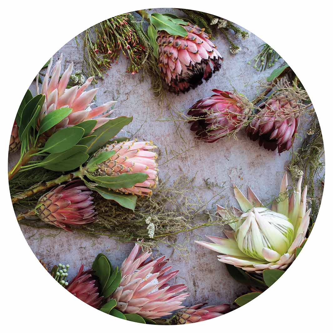 FLORAL PINK MIXED KING PROTEAS VINYL FOAM ROUND MAT